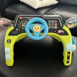 Fisher price sit and learn steer drive toy
