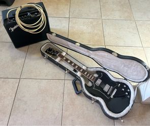 Black Gibson SG w/ Fender Mustang LT50 amp