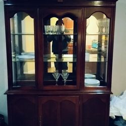 Two-piece China Cabinet unit with glass shelves and storage cubby