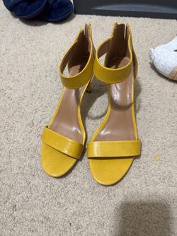 Brand new size 9 Yellow Snake Embossed Ankle Strap Heels