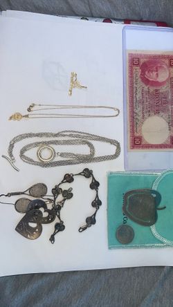 14k solid yellow gold 2.70 Grams / .925 Silver over 1 oz and 15 grams all authentic guaranteed