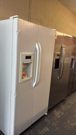 Like new GE side by side refrigerator