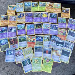 Lot of 120 Regular & 10 Holographic Pokémon Cards