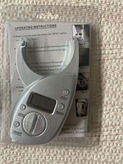 Stop watch and body fat caliper 