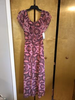 Size large ladies dress new with tags $40 or best offer . Buy two for $70