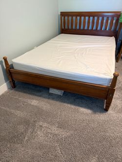 Antique solid wood bed frame. Full size