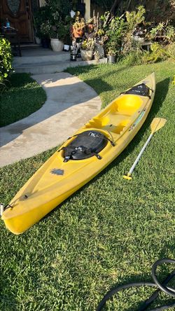 Yellow Sit-In Kayak with Paddle