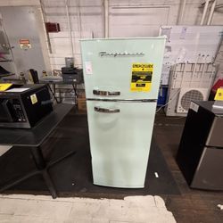 Brand new teal antique fridge