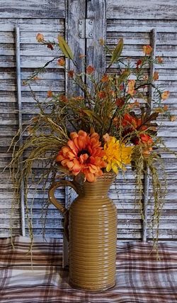 Ht-20in width-19in HANDMADE artificial Fall floral /greenery in a mustard color vase