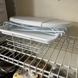 Trash rack for kitchen cabinet
