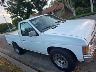 White Nissan Pickup Truck Regular Cab