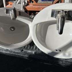 2 Sinks With Faucets