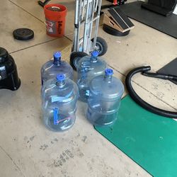 4 Five Gallon Water Jugs 