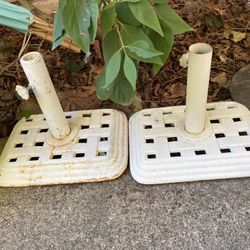 Two matching umbrella holders 