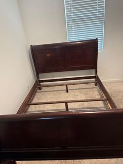 Queen hard wood sleigh bed frame (used good)