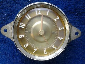 Auto clock, i think is from an earily 50s buick,fits in the glove box door.