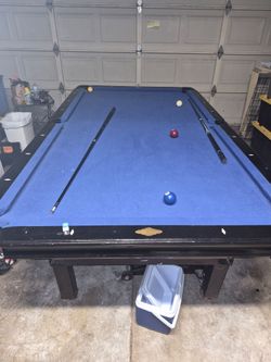 Pool table and dart board