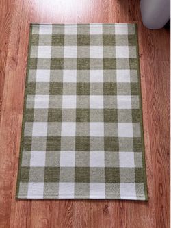 Green checkered carpet