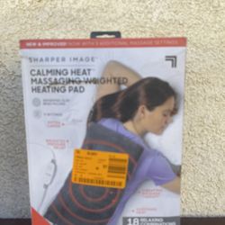 Massaging weighted heated pad