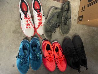 4 Nike tennis shoes (sneakers) and 1 pair of Puma Sneakers