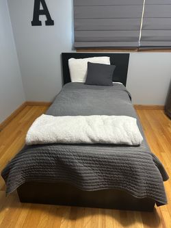 2 twin size ikea beds with one side of pulley drawers each ($220 each) - comes with the mattresses