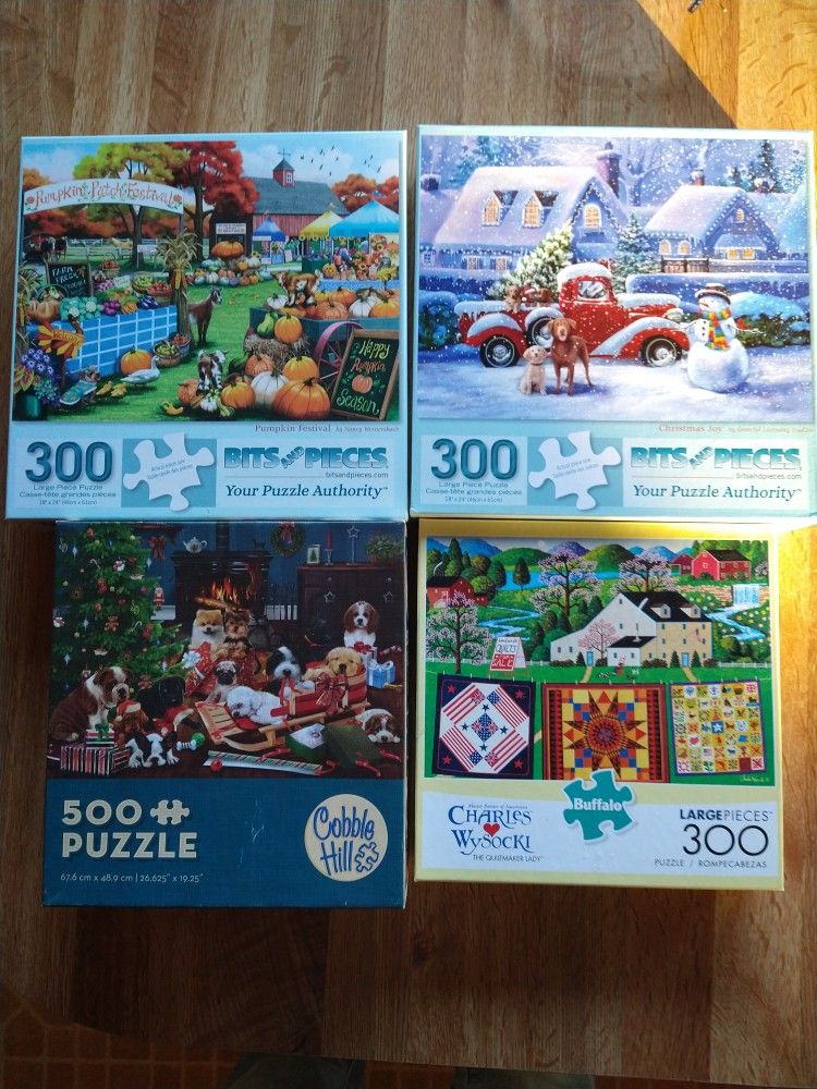 Four Quality 300 Piece Puzzles