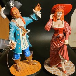WALT DISNEY " WE WANT THE REDHEAD "  set Of 2 " AUCTIONEER & REDHEAD " PIRATES FIGURINE SET