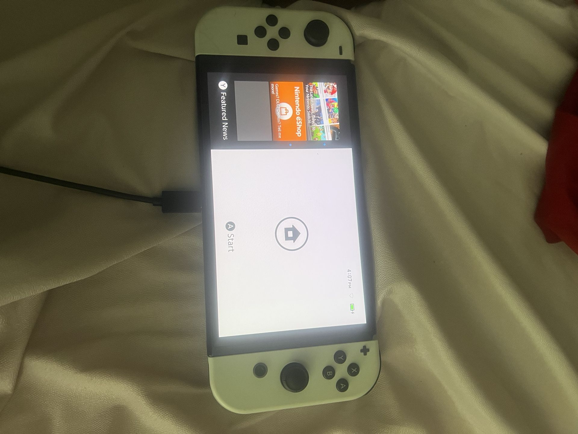 Nintendo Switch – OLED Model w/ White Joy-Con