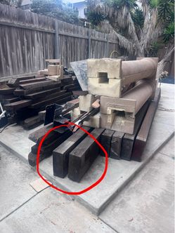 23 ft Treated timber (2 pieces, $75 each, $125 for both)