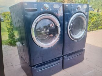 LG BLUE STEAM WASHER AND ELECTRIC STEAM DRYER SUPERCAPACITY WITH PEDESTALS