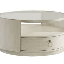 Round Cocktail/Coffee Table ( Brand New) Glass Top And Has Wheels