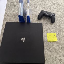 PS4 Slim + Controller + 4 Games Bundle