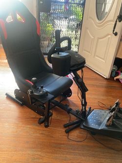Racing Sim Cockpit Setup with Logitech Wheel, Shifter, hand brake, and pedals