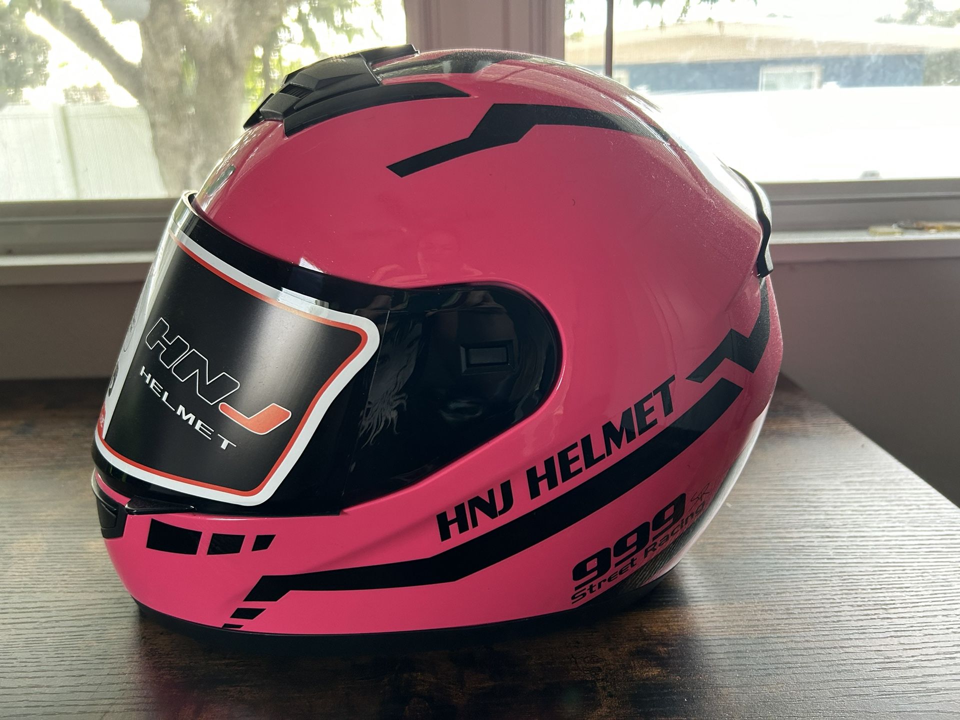 Pink, medium motorcycle helmet