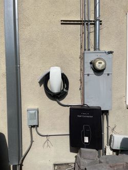 Tesla wall connector EV car charger outlet nema 1450
