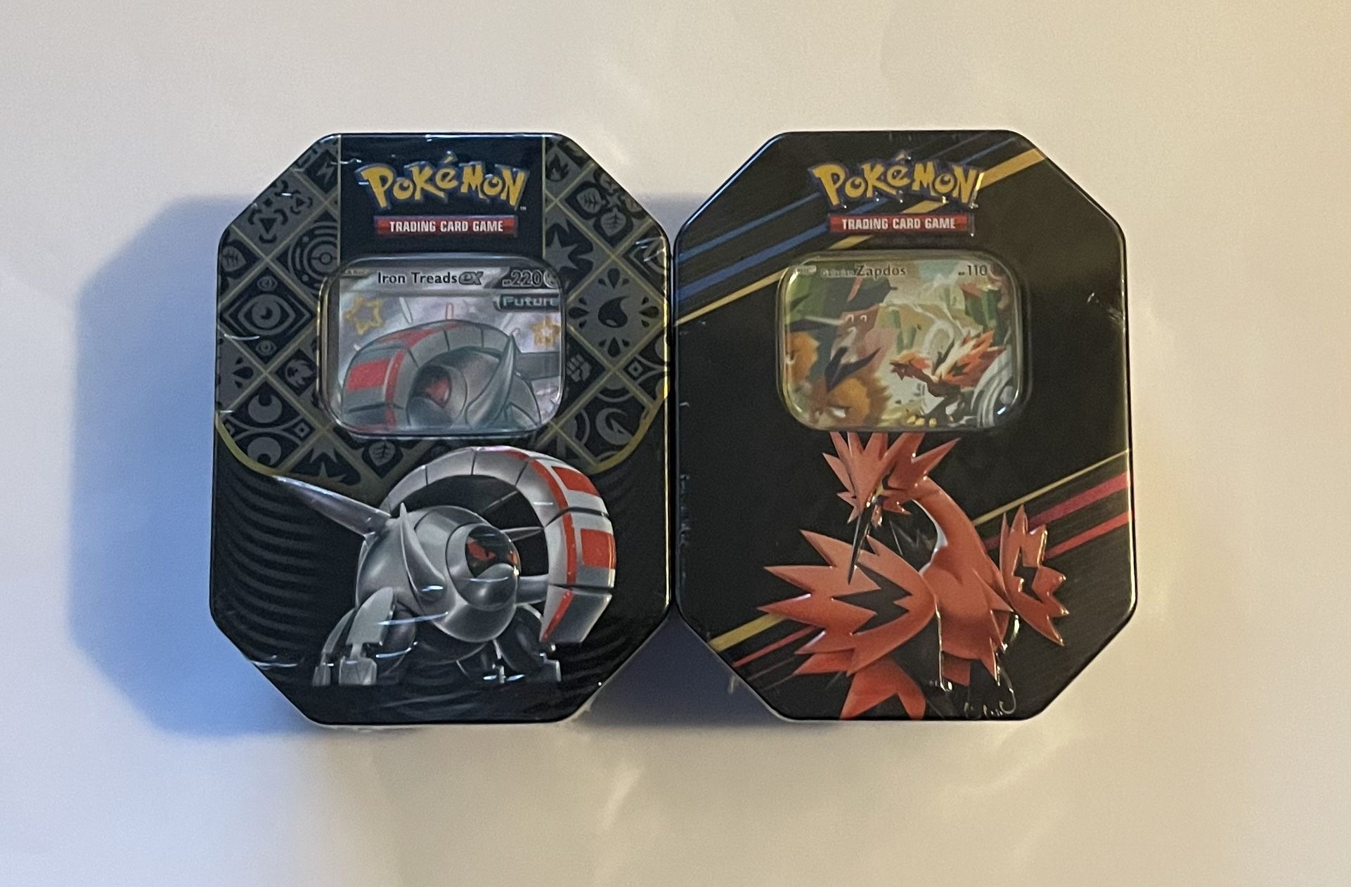 CZ And Paldean Fates Tins