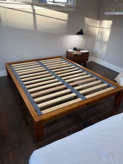 Thuma bed frame full size in walnut