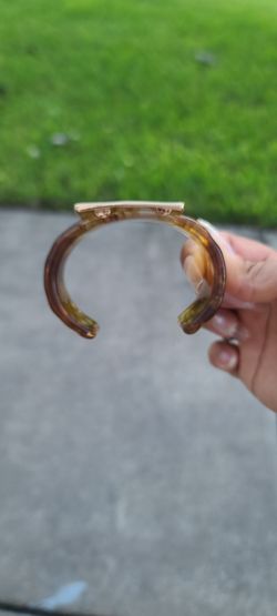 Acrylic cuff with gold accents