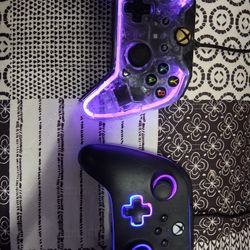 Afterglow Prismatic Controller for Xbox One  AndPowerA Spectra Enhanced Illuminated Wired Controller for Xbox, featuring customizable RGB lighting. 