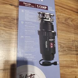MOEN GXP33c GARBAGE DISPOSAL. 