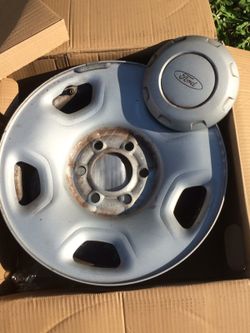 Ford F-150 steel rims w center caps. 6 lugs