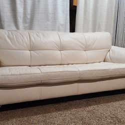 Ashley Furniture - Brilliant White Leather Sofa and matching Chair. Very Comfortable & Clean Couch Set