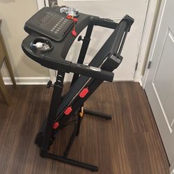 Black and red, 42 in tall when folded, 24 inches wide. Treadmill is 34 lbs