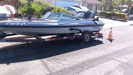 Invader Boat with Mercury Outboard and Trailer