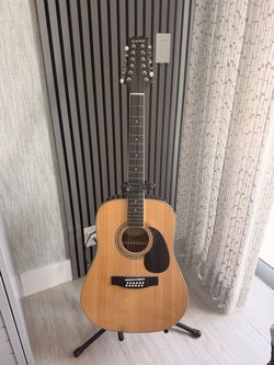 12 String Mitchell guitar (with stand)
