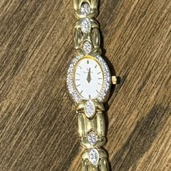 14 karat gold watch with diamonds