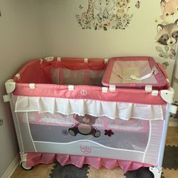 pink baby crib w changing table 