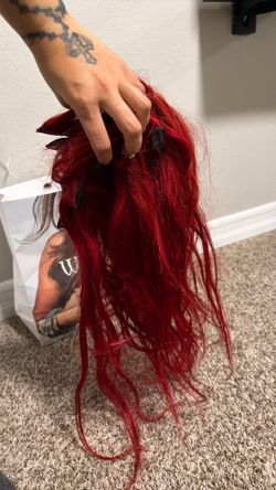 Red human hair clip in extensions