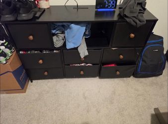 Black dresser with drawers