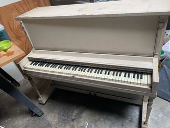 1928 upright piano with piano bench